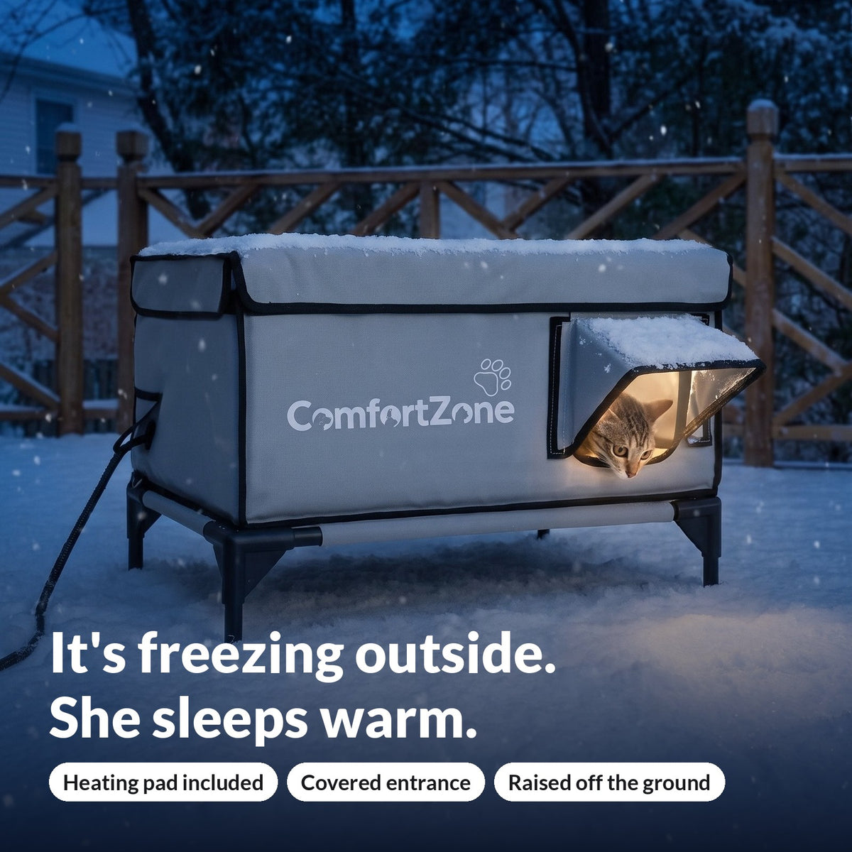 Comfort Zone at night in the snow: heated outdoor cat shelter